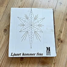 Julestjerne i hvit og gull metall for vindu fra Markslöjd