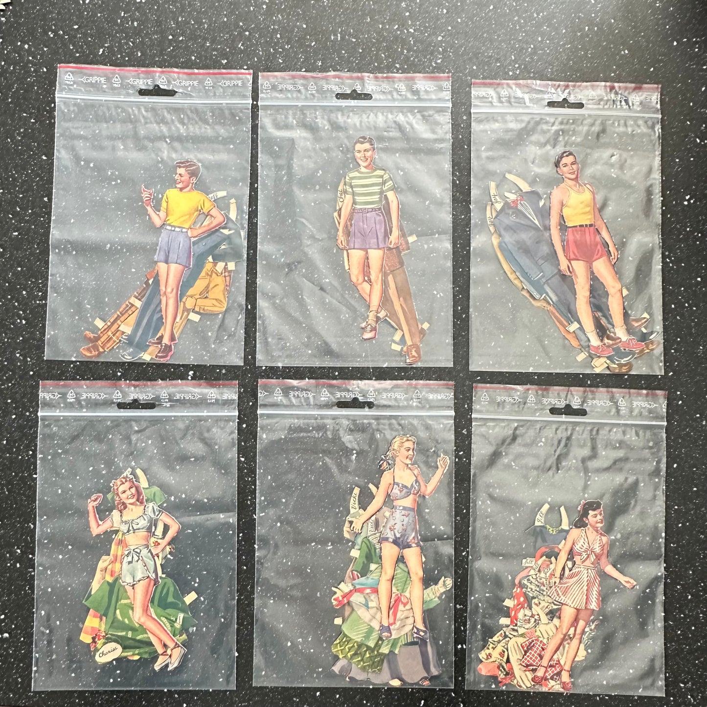 6 stk flotte papirdukker + klær fra Teen Town 1946