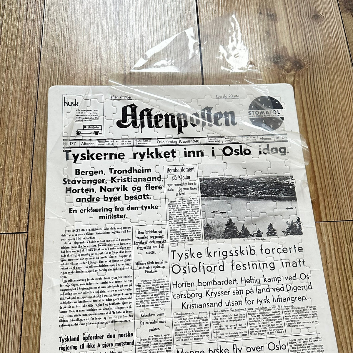 Aftenposten 9. April 1940 fremsiden som Puslespill