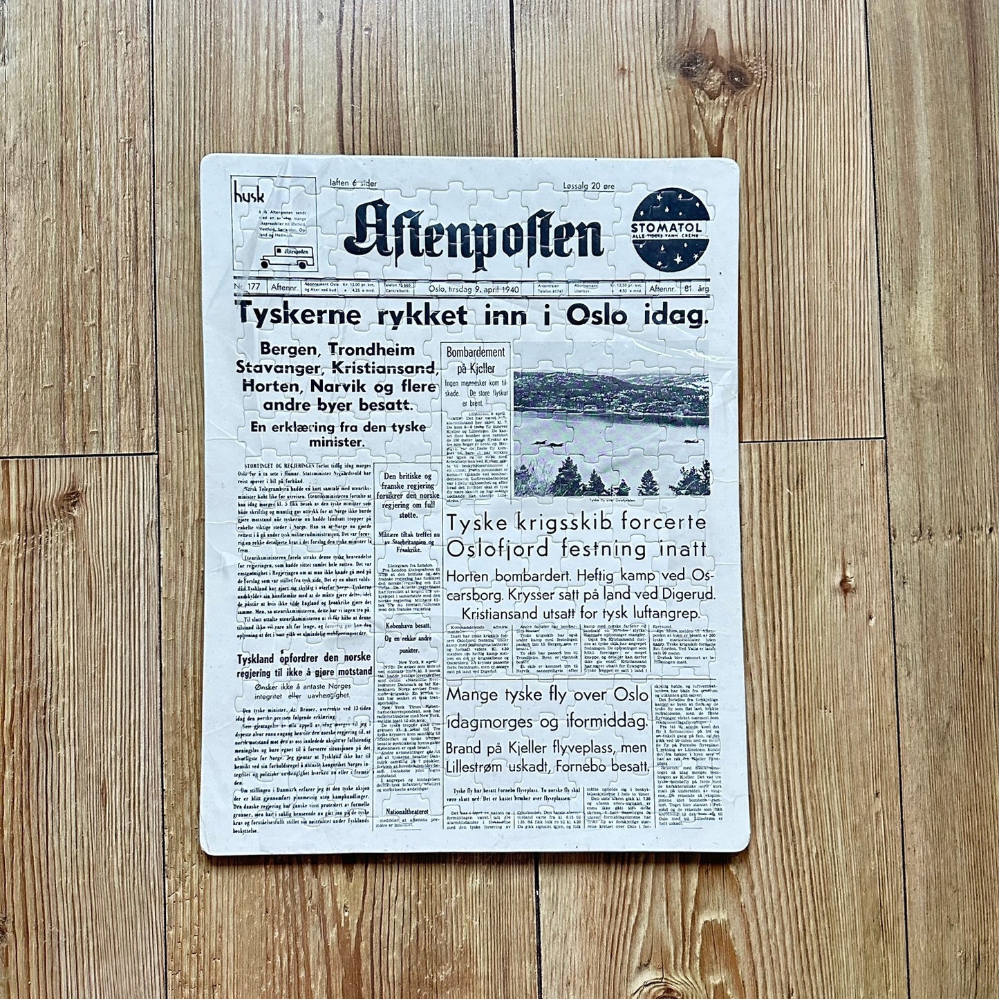 Aftenposten 9. April 1940 fremsiden som Puslespill