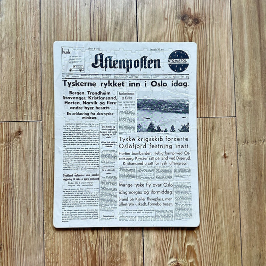 Aftenposten 9. April 1940 fremsiden som Puslespill