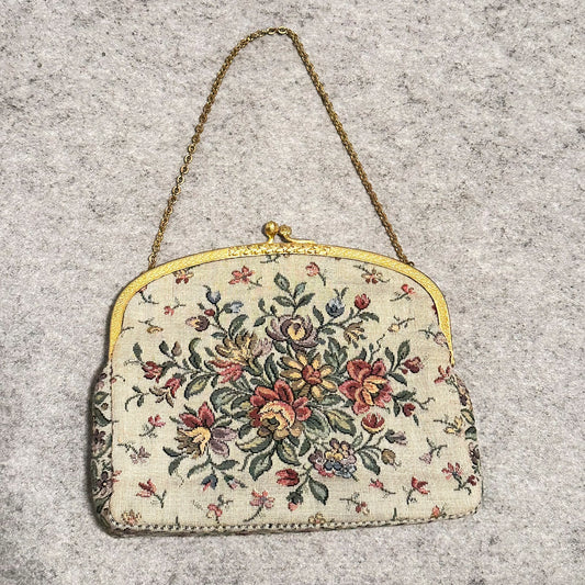 Vintage selskapsveske i tekstil med blomster. I flott stand